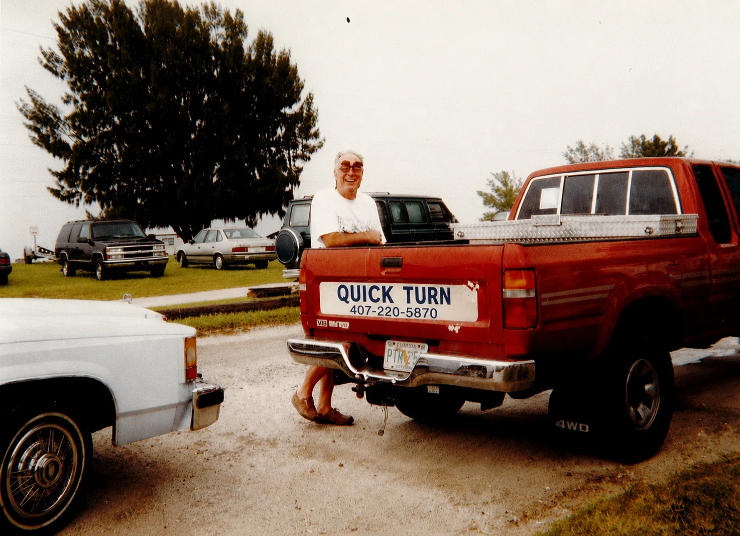 Original QuickTurn Cabinets red truck archive photo